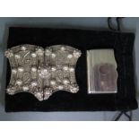 A Ladies silver belt buckle of ornate pierced design and a silver hallmarked vinaigrette with