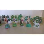 A collection of five 19th century Staffordshire bocage figures - tallest 16cm - chips and losses to