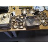 A selection of silver plated items including entrée dishes, flambé pans, sauce boats etc.