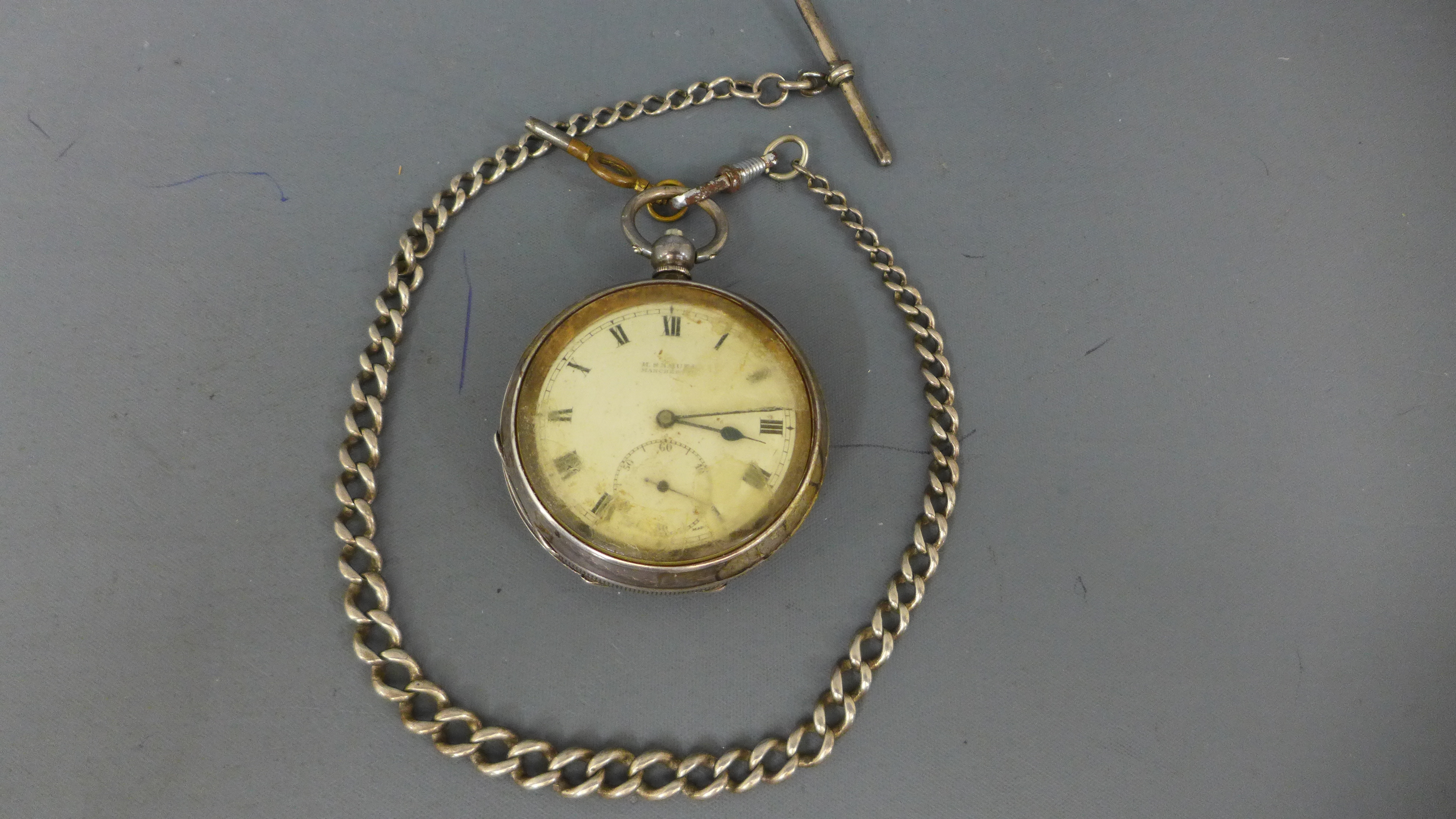 A silver hallmarked open faced pocket watch by H.