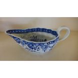 A 19th century Worcester blue and white sauce boat - Height 18cm - chip to spout Provenance: