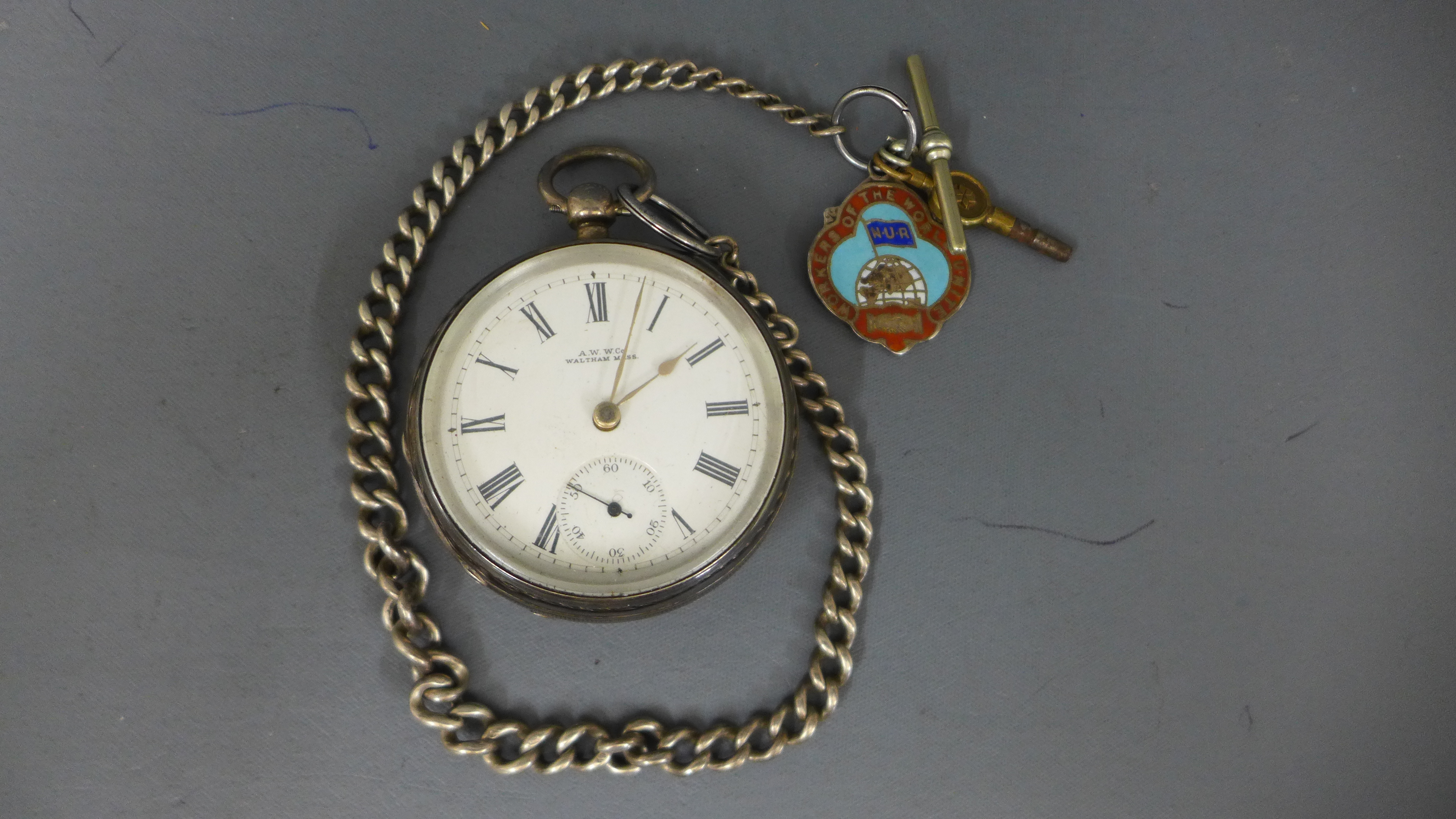 A silver hallmarked open faced pocket watch by Ansonia Watch Company Waltham Massachusetts,