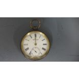 A silver hallmarked open faced pocket watch by Kendal and Dent,