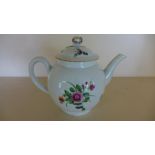 An 18th century Worcester teapot with brightly coloured sprays of flowers and a ladybird floral