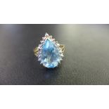 A topaz dress ring with diamond highlight - Hallmarked Birmingham - Ring size N 1/2 - Weight approx