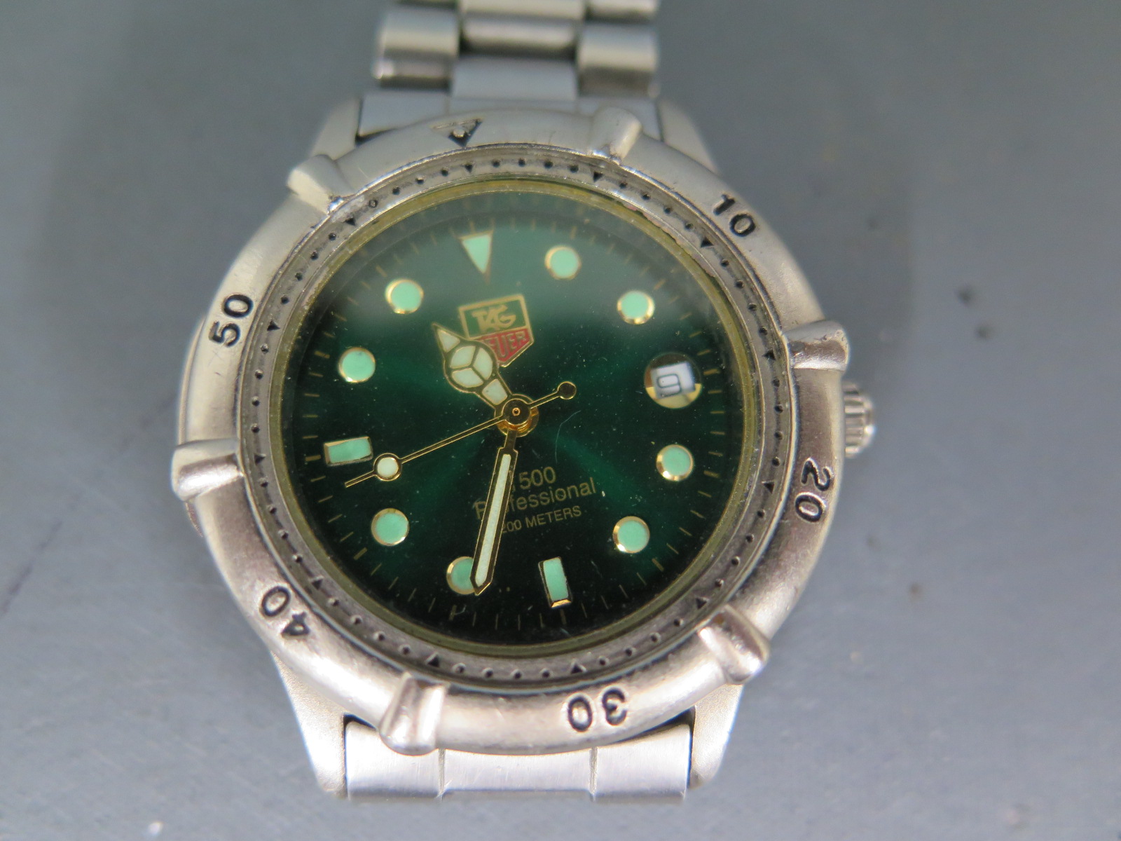 A Tag Heuer mid sized quartz wristwatch with offset dial date aperture - not in working order, - Image 2 of 3