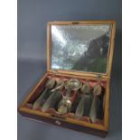 A Continental silver travelling tea making set with twelve tea spoons, an infuser,