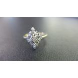 A 9ct gold diamond cluster ring - Hallmarked Birmingham - Ring size N - Weight approx 1.
