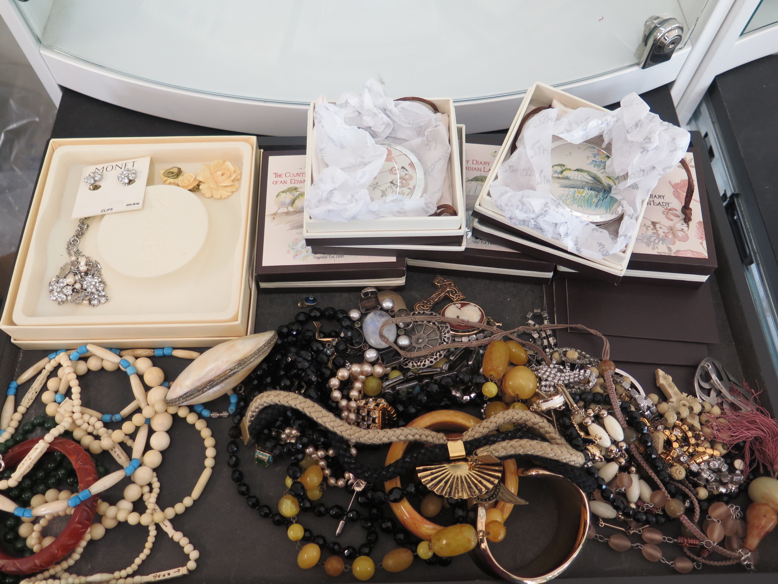 An assortment of vintage and costume jewellery,