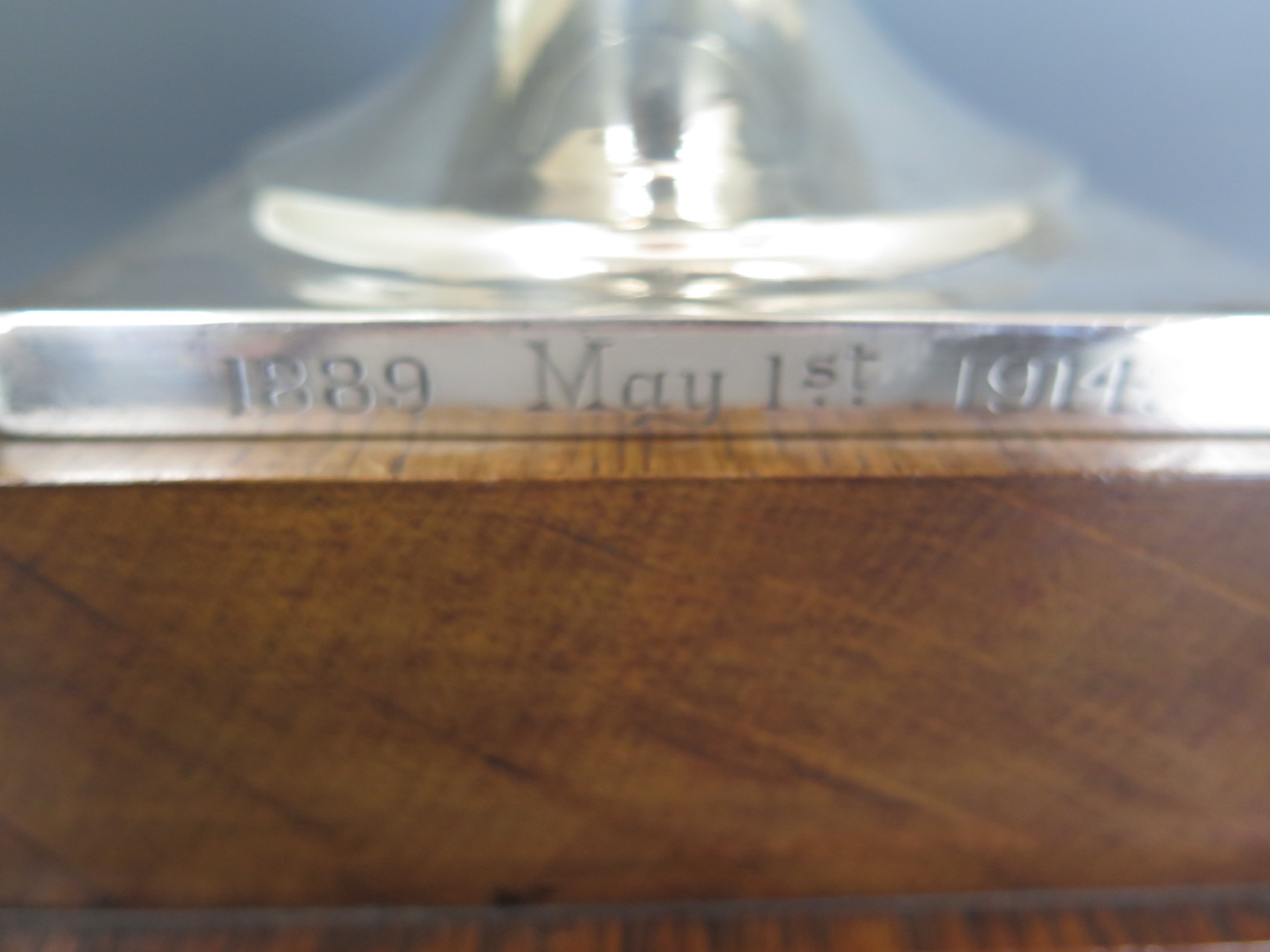 A silver presentation twin handled bowl on wooden stand London 1913/14 TB&S - Height 23cm approx - Image 3 of 4