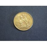 A Victorian 22ct gold Sovereign dated 1891