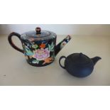 A small 19th century Davenport teapot - Height 7cm - some minor chips - and a miniature black