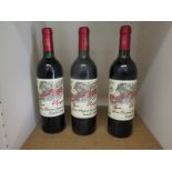 Three bottles of 75cl of Castillo Ygay Gran Reserva Especial Cosecha 1989 Rioja - top of shoulder