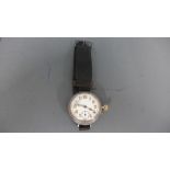 A World War One silver cased trench watch with Arabic numerals to white enamel circular dial,