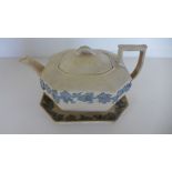 A 19th century Wedgewood cream basalt octagonal teapot with grape and vine decoration - Height 8cm