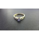 A 9ct gold illusion-set diamond ring - Total diamond weight 0.