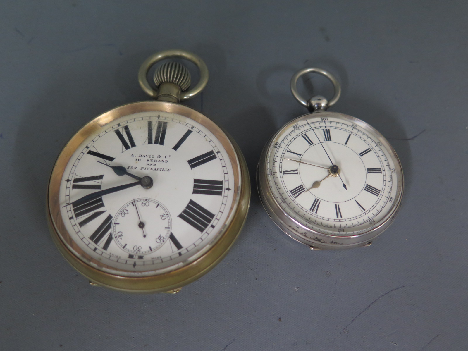 A large pocket watch, Roman numerals to white enamel dial with subsidiary second hand at 6 o'clock,