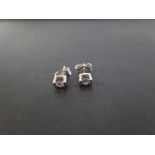 A pair of 9ct gold brilliant-cut diamond earrings - Hallmarked London - Weight approx 0.