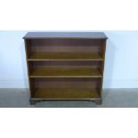 A 20th century oak open bookcase with adjustable shelves