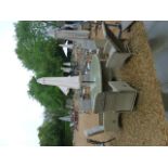 A Bramblecrest Sahara 210cm oval table with six reclining armchairs with cushions and a parasol and