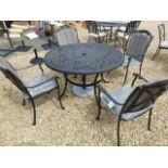 A Bramblecrest aluminium table and four chairs with cushions