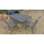 A Bramblecrest garden table with 4 chairs and a parasol and base 145cm x 90cm -