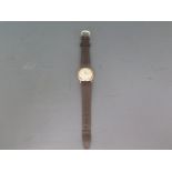 A 9ct gold cased Tudor wristwatch, Arabic numerals to 12, 3, 6 and 9,