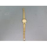 A ladies Omega gold plated wristwatch on plated strap,