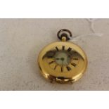 An 18ct yellow gold cased half Hunter pocket watch, Roman numerals to outer and inner chapter ring,