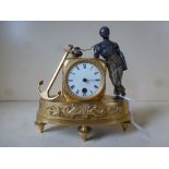 A 19th century gilded bronze mantel clock with a standing figure of a Negro Sailor with enamel 5cm