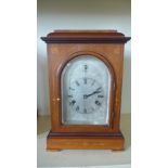 A mahogany inlaid Junghams chiming mantel clock,