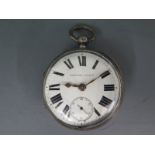 A silver cased open faced pocket watch, white enamel dial with bold Roman numerals to chapter ring,