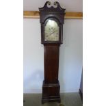 A mahogany 8 day striking longcase clock with an arched 12 inch silvered dial signed WM Nicklas