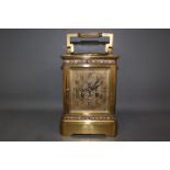 A large French Carriage clock 19th century eight day movement, striking hours and half hours,