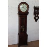A 19th century mahogany eight day longcase clock with a painted 14" circular dial having secondary