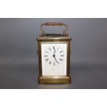 A late 19th early 20th century French carriage clock, stamped to the rear R & Co.