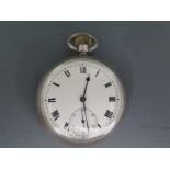 A silver cased open faced pocket watch white enamel dial with Roman numerals to chapter ring,