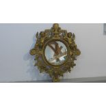 A Victorian cast iron decorative wall mirror with the motto Welcome Welcome Thrice - 62cm x 54cm