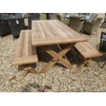 A Bramblecrest teak table with two benches the end of the bench is broken off- 180cm x 90cm