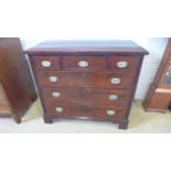 A 19th century mahogany chest with three small over three long drawers on bracket feet in very
