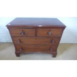 An early 19th century mahogany chest of small proportions with canted sides - Height 79cm x Width