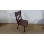 A 19th century mahogany Gothic design hall chair with pierced splat,