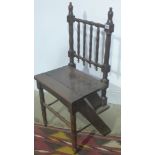 An 19th century oak folding metamorphic library chair/steps