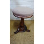A 19th century rosewood revolving music stool