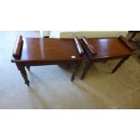 A pair of reproduction mahogany window seats with scroll ends raised on turned supports - 64cm x