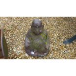 A seated Buddha figure - Height 38cm