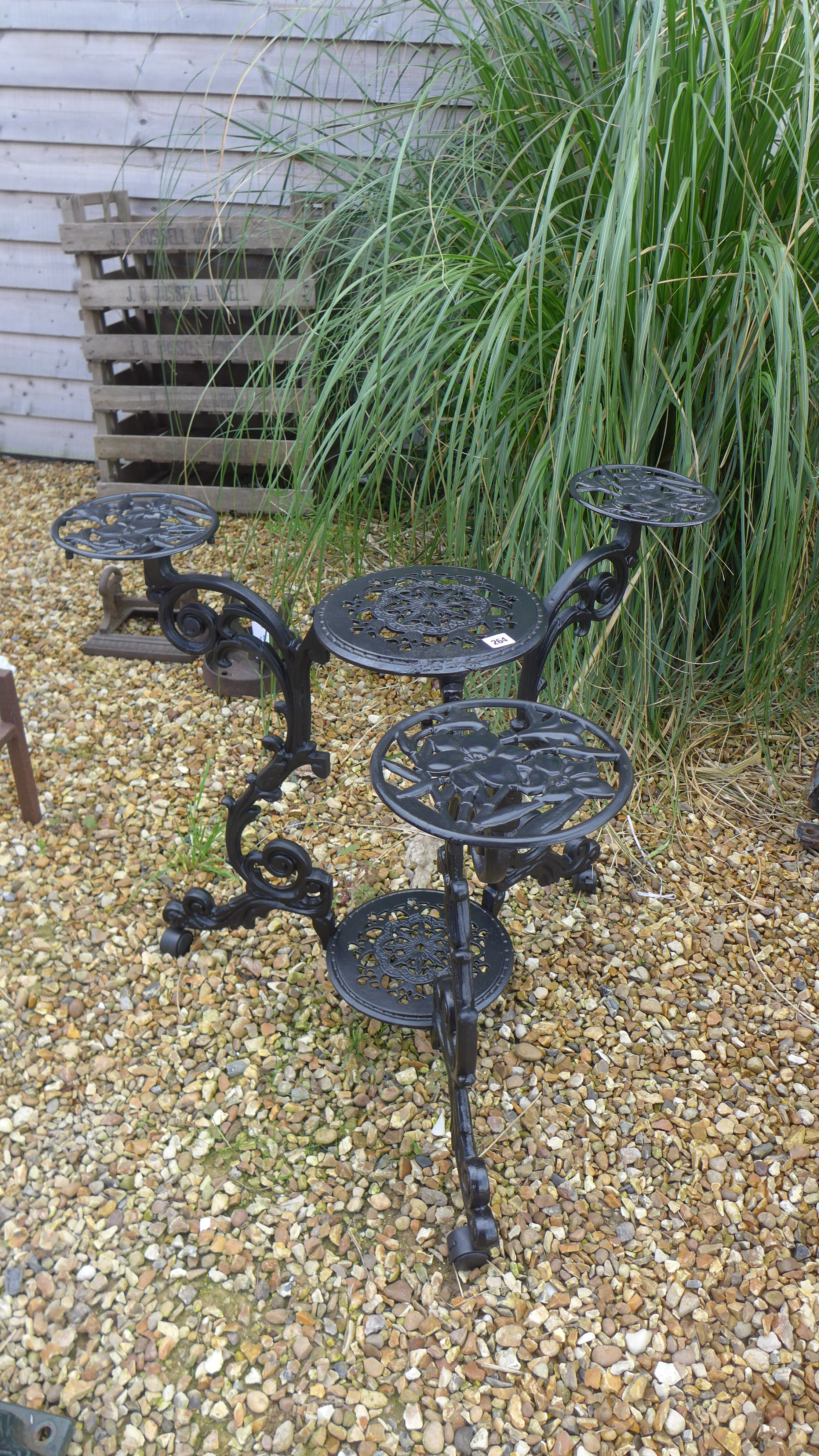 An ironwork plant stand - Height 73cm x 88cm