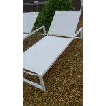 An ex display Life Outdoors designer sun loungers in white