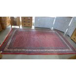 A Caucasian carpet with a red field - 330cm x 210cm - in good condition