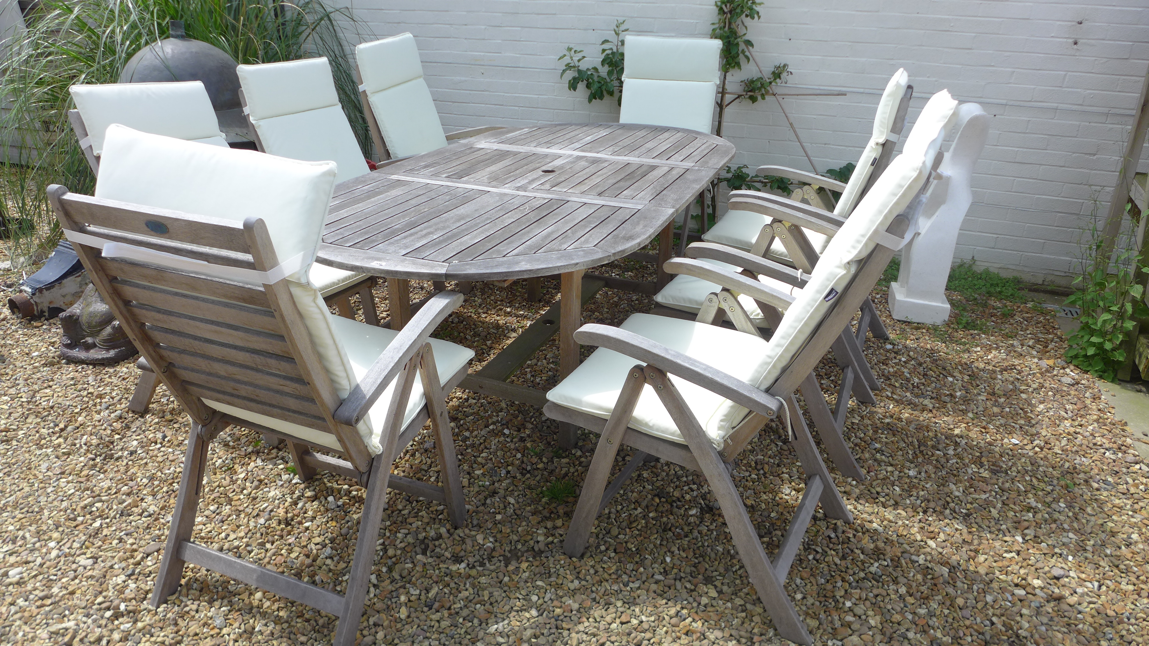 A good quality secondhand Alfresco eight seat reclining dining set with cushions - table 160 x